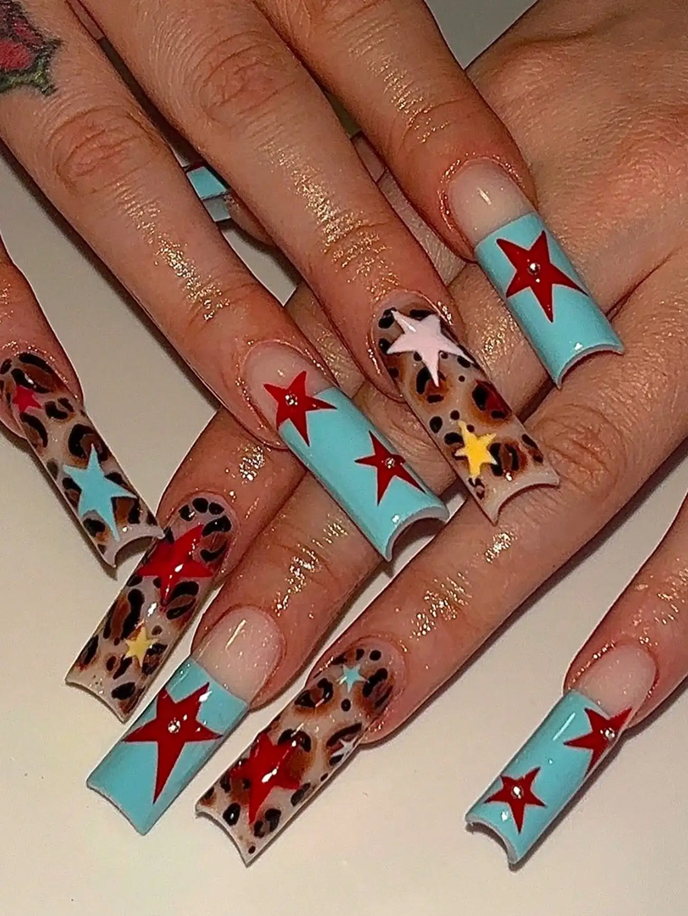 24Piece Long, Press On Nails Square Designs Include Leopard Print, Colorful Stars, And French Tips Accented With Red Stars And Rhinestones. These High-Quality Fake Nails Are Detachable, Reusable, And Versatile-Perfect For Young Women, Holidays, Gatherings
24Piece Long, Press On Nails Square Designs Include Leopard Print, Colorful Stars, And French Tips Accented With Red Stars And Rhinestones. These High-Quality Fake Nails Are Detachable, Reusable, And Versatile-Perfect For Young Women, Holidays, Gatherings