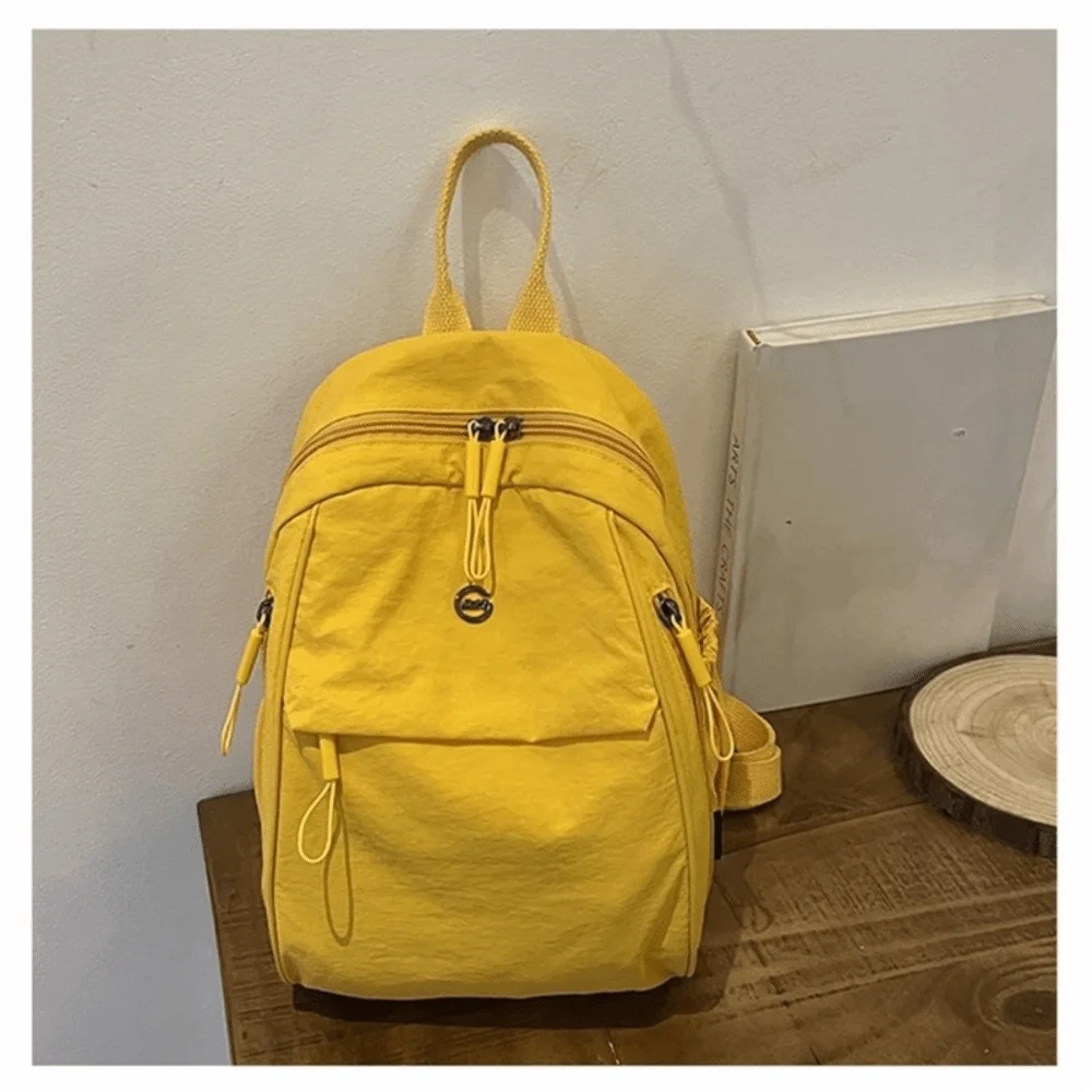 Однотонный рюкзак из ткани Оксфорд, нейлоновая повседневная сумка через плечо большой вместимости, повседневный легкий дорожный рюкзак с регулируемым ремешком
Однотонный рюкзак из ткани Оксфорд, нейлоновая повседневная сумка через плечо большой вместимости, повседневный легкий дорожный рюкзак с регулируемым ремешком