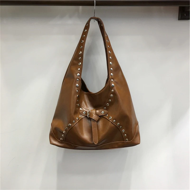 American Retro Rivet Motorcycle Style Tote Bag Casual Single Shoulder Underarm Handbag 2025 New Unique Buckle Commuter Bag
American Retro Rivet Motorcycle Style Tote Bag Casual Single Shoulder Underarm Handbag 2025 New Unique Buckle Commuter Bag