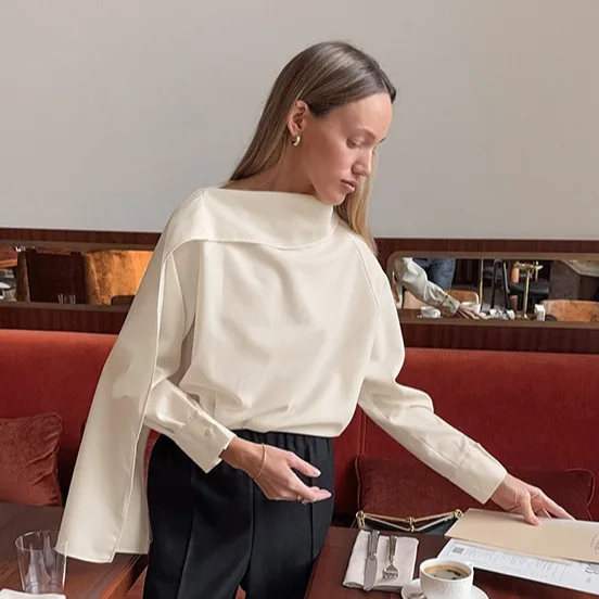 Женская рубашка с длинными рукавами, украшенная лентами, абрикосового цвета, создающая ощущение роскоши, приталенного кроя и стройнящего силуэта, для повседневной носки.
Женская рубашка с длинными рукавами, украшенная лентами, абрикосового цвета, создающая ощущение роскоши, приталенного кроя и стройнящего силуэта, для повседневной носки.