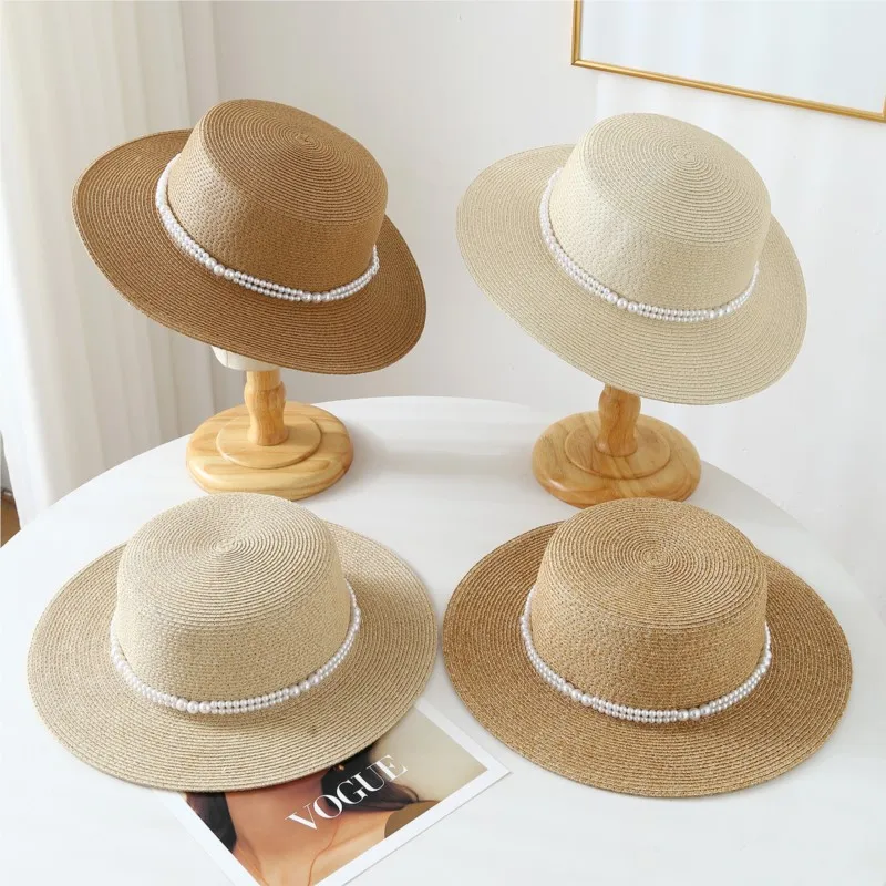 A small light and luxurious versatile pearl chain top hat woven large-brimmed women's shade
A small light and luxurious versatile pearl chain top hat woven large-brimmed women's shade