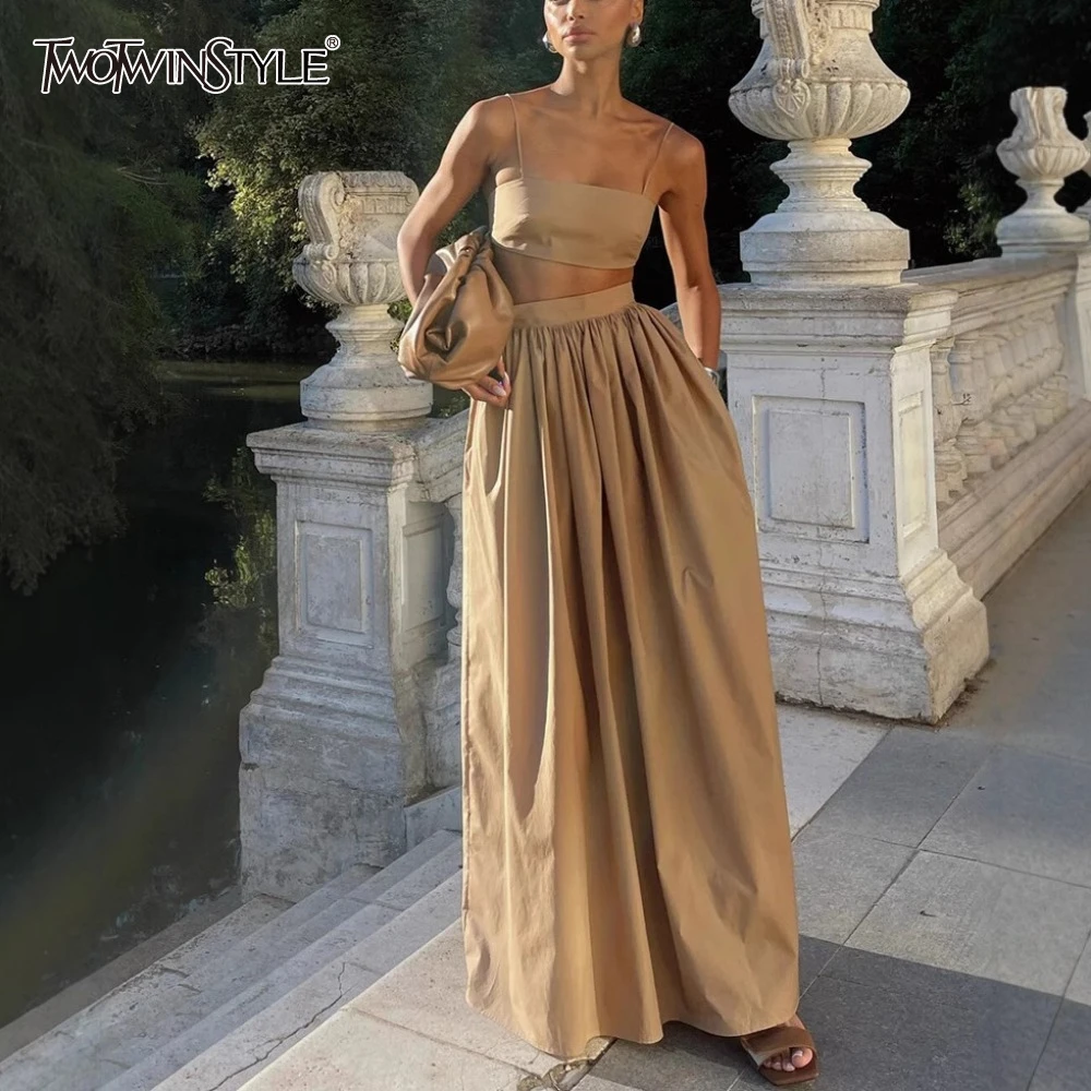 TWOTWINSTYLE Solid Two Piece Set for Women Strapless Sleeveless Vest High Waist Loose Skirt Elegant Sets Female Fashion
TWOTWINSTYLE Solid Two Piece Set for Women Strapless Sleeveless Vest High Waist Loose Skirt Elegant Sets Female Fashion
