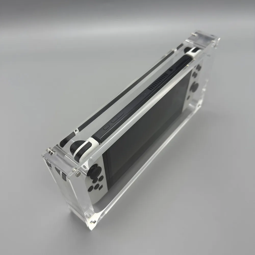 Магнитный акриловый ящик для хранения игровой консоли Nintendo Switch OLED, прозрачная крышка, подставка для дисплея, игровые аксессуары
Магнитный акриловый ящик для хранения игровой консоли Nintendo Switch OLED, прозрачная крышка, подставка для дисплея, игровые аксессуары