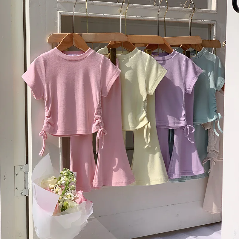 Girls 2 Piece Outfit Solid Color Short Sleeve Top Flared Pants Set Casual Summer Matching Kids Clothes Baby Soft Comfy Suit
Girls 2 Piece Outfit Solid Color Short Sleeve Top Flared Pants Set Casual Summer Matching Kids Clothes Baby Soft Comfy Suit