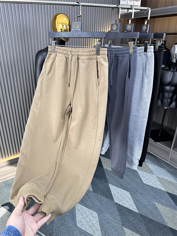 Трикотажные спортивные брюки из римской ткани, мужские повседневные брюки свободного покроя, весенние однотонные брюки с эластичной резинкой на талии, модные брюки
Трикотажные спортивные брюки из римской ткани, мужские повседневные брюки свободного покроя, весенние однотонные брюки с эластичной резинкой на талии, модные брюки