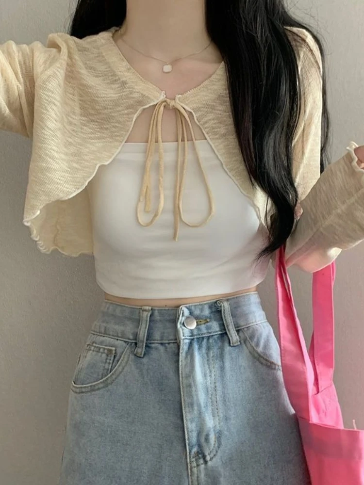 Long Sleeve Thin Crop Top 2026 Summer Ice Silk Knit Women Cardigan Shawl Sun Protection Outerwear Loose Versatile Cover Up
Long Sleeve Thin Crop Top 2026 Summer Ice Silk Knit Women Cardigan Shawl Sun Protection Outerwear Loose Versatile Cover Up