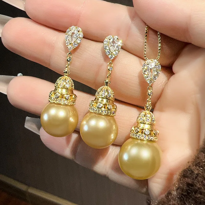 Gold-plated set with gold pearls and elegant tassels for women16-14mm
Gold-plated set with gold pearls and elegant tassels for women16-14mm