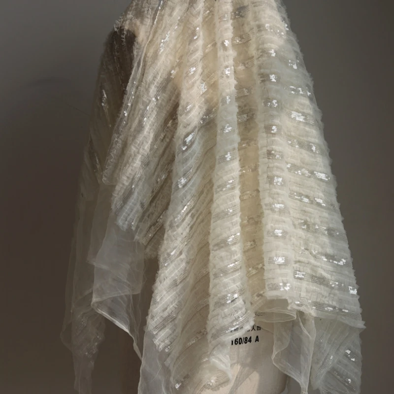 Apricot Lace Net Fabric with 3D Appliques and Shimmering Sequins for Wedding Bridal Gowns and Formal Dresses
Apricot Lace Net Fabric with 3D Appliques and Shimmering Sequins for Wedding Bridal Gowns and Formal Dresses