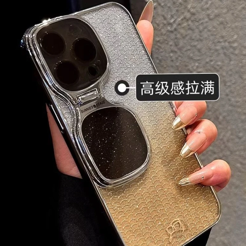 High-end sunglasses stand phone case suitable for iPhone14 new high-end 15promax lens all-inclusive drop-proof protective cover
High-end sunglasses stand phone case suitable for iPhone14 new high-end 15promax lens all-inclusive drop-proof protective cover
