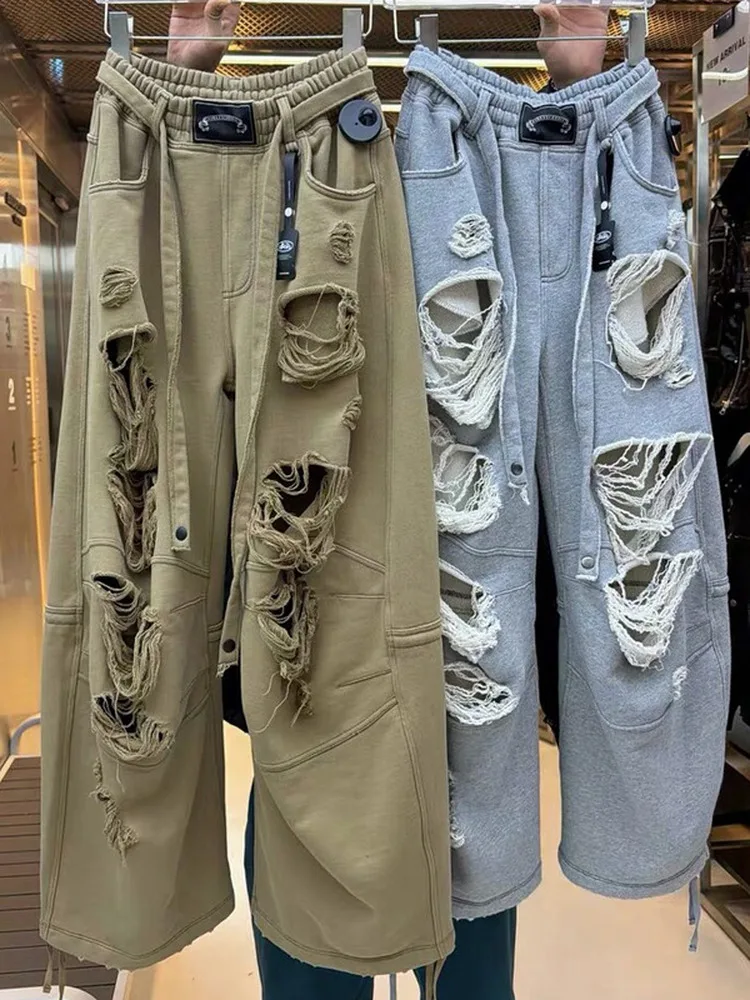 American Style Loose Jazz Dancing Wide Leg Pants Men's Women's Workwear Style Faded Hole Drawstring Sweatpants
American Style Loose Jazz Dancing Wide Leg Pants Men's Women's Workwear Style Faded Hole Drawstring Sweatpants