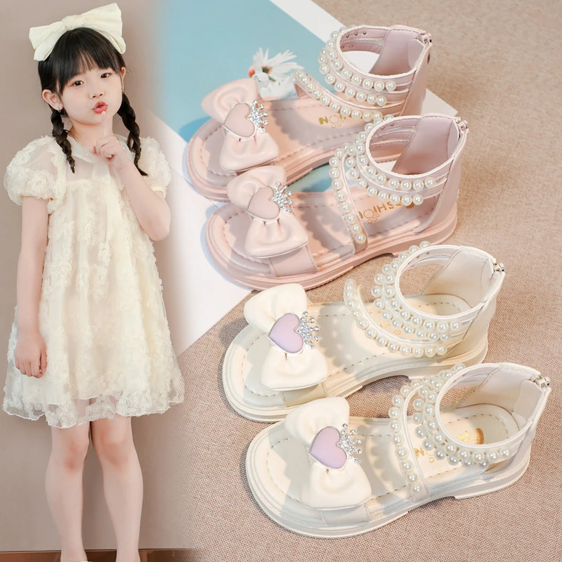 *Fashionable and Elegant Round Head Pearl Soft Princess Flat Sandals Summer New Bow Children's Open Toed Casual Shoes
*Fashionable and Elegant Round Head Pearl Soft Princess Flat Sandals Summer New Bow Children's Open Toed Casual Shoes