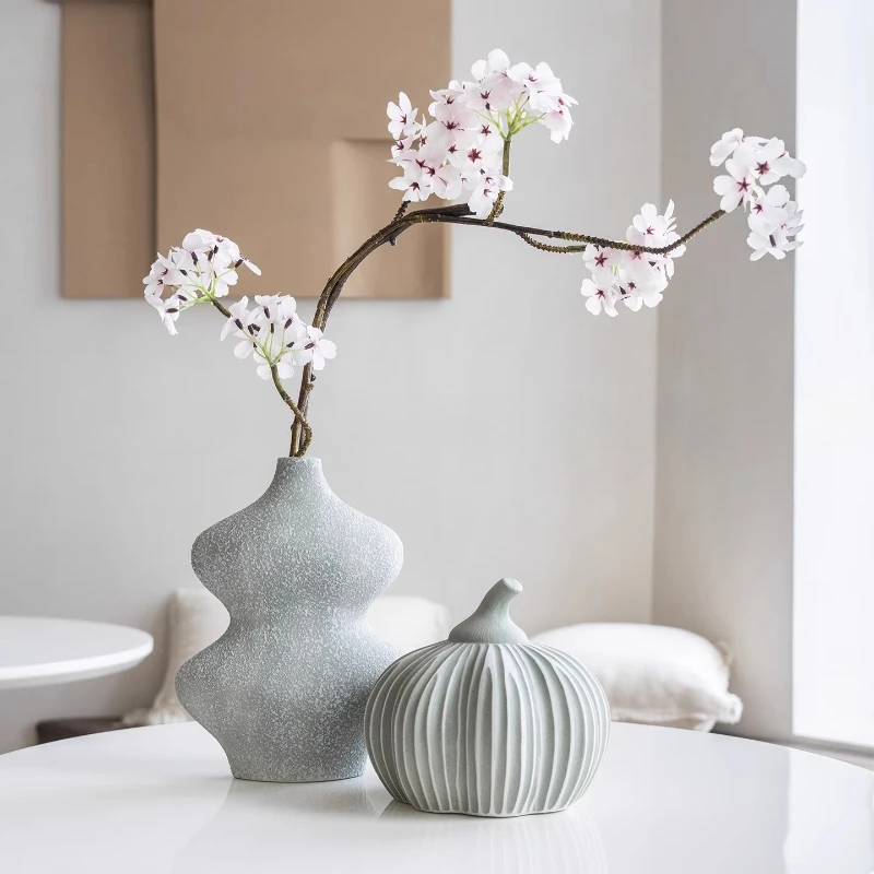 Nordic minimalist shaped ceramic dried flower vase pumpkin gourd ornament living room TV cabinet dining room desktop decoration
Nordic minimalist shaped ceramic dried flower vase pumpkin gourd ornament living room TV cabinet dining room desktop decoration