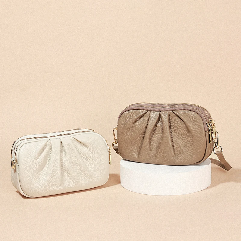 Casual Women's Genuine Cowhide Leather Soft Small Cloud Phone Bag For Ladies Three Layers of Zipper Crossbody Bag Brand Designer
Casual Women's Genuine Cowhide Leather Soft Small Cloud Phone Bag For Ladies Three Layers of Zipper Crossbody Bag Brand Designer