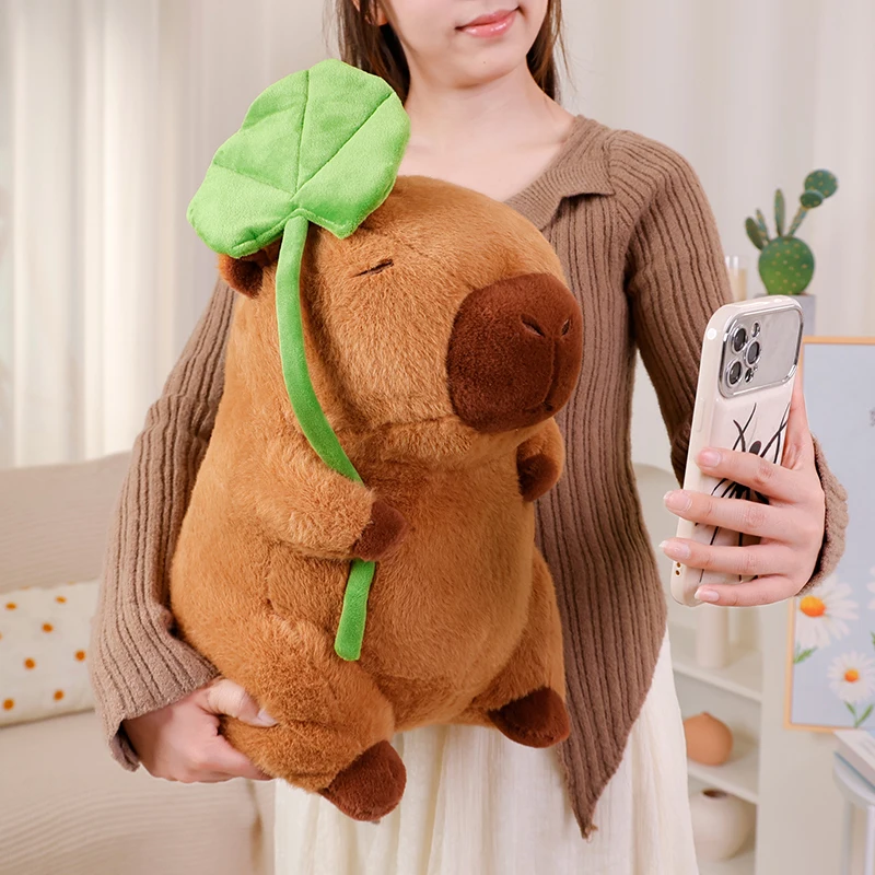 New Holding Lotus Leaf Capybara Soft Plush Doll Funny Capybara Plush Doll Home Decor Birthday Gift
New Holding Lotus Leaf Capybara Soft Plush Doll Funny Capybara Plush Doll Home Decor Birthday Gift