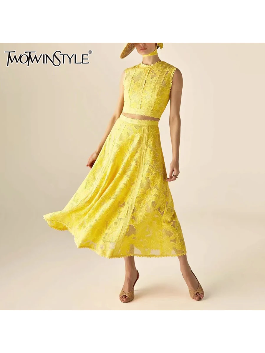 TWOTWINSTYLE Solid Two Piece Sets For Women O Neck Sleeveless Top High Waist A Line Skirt Elegant Suit Female Clothing Fashion
TWOTWINSTYLE Solid Two Piece Sets For Women O Neck Sleeveless Top High Waist A Line Skirt Elegant Suit Female Clothing Fashion