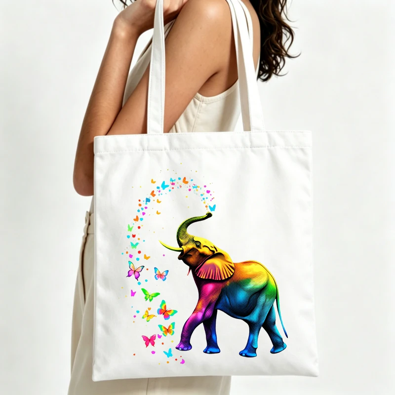 rainbow elephant graphic canvas tote bag with butterfly print, ideal for casual daily use and summer outings
rainbow elephant graphic canvas tote bag with butterfly print, ideal for casual daily use and summer outings