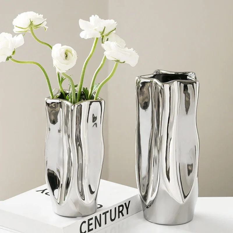 Luxury Electroplated Silver Ceramic Vase Flower Arrangement Irregular Porcelain Hydroponic Vase Ornament Interior Art Decoration
Luxury Electroplated Silver Ceramic Vase Flower Arrangement Irregular Porcelain Hydroponic Vase Ornament Interior Art Decoration