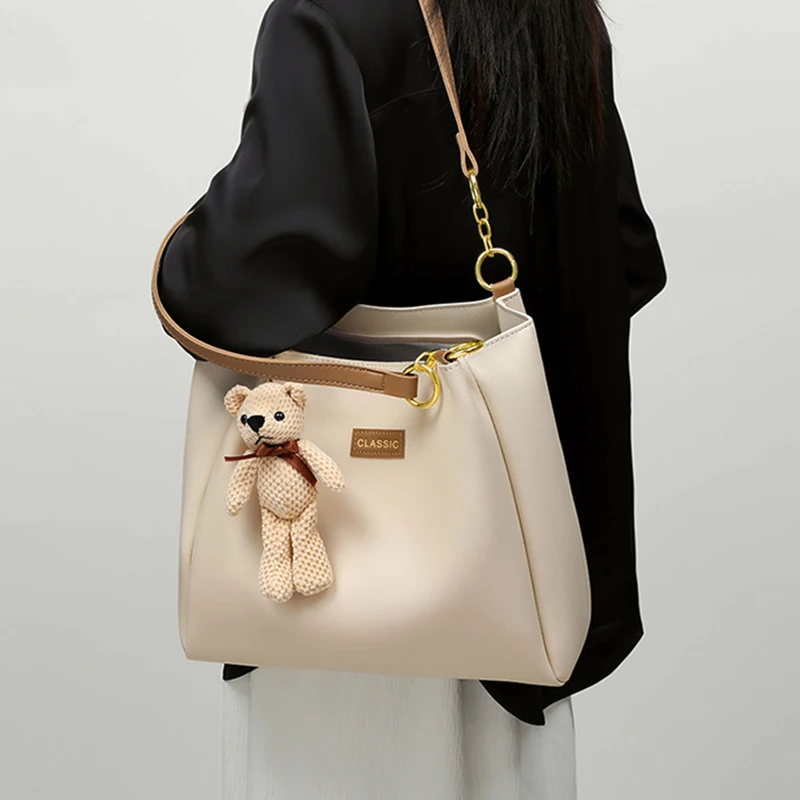 Women Beige Genuine Leather Gift-Ready Tote Bag Lady Cute Bear Pendant Cow Leather Shoulder Bag Female Large Capacity Handbag
Women Beige Genuine Leather Gift-Ready Tote Bag Lady Cute Bear Pendant Cow Leather Shoulder Bag Female Large Capacity Handbag