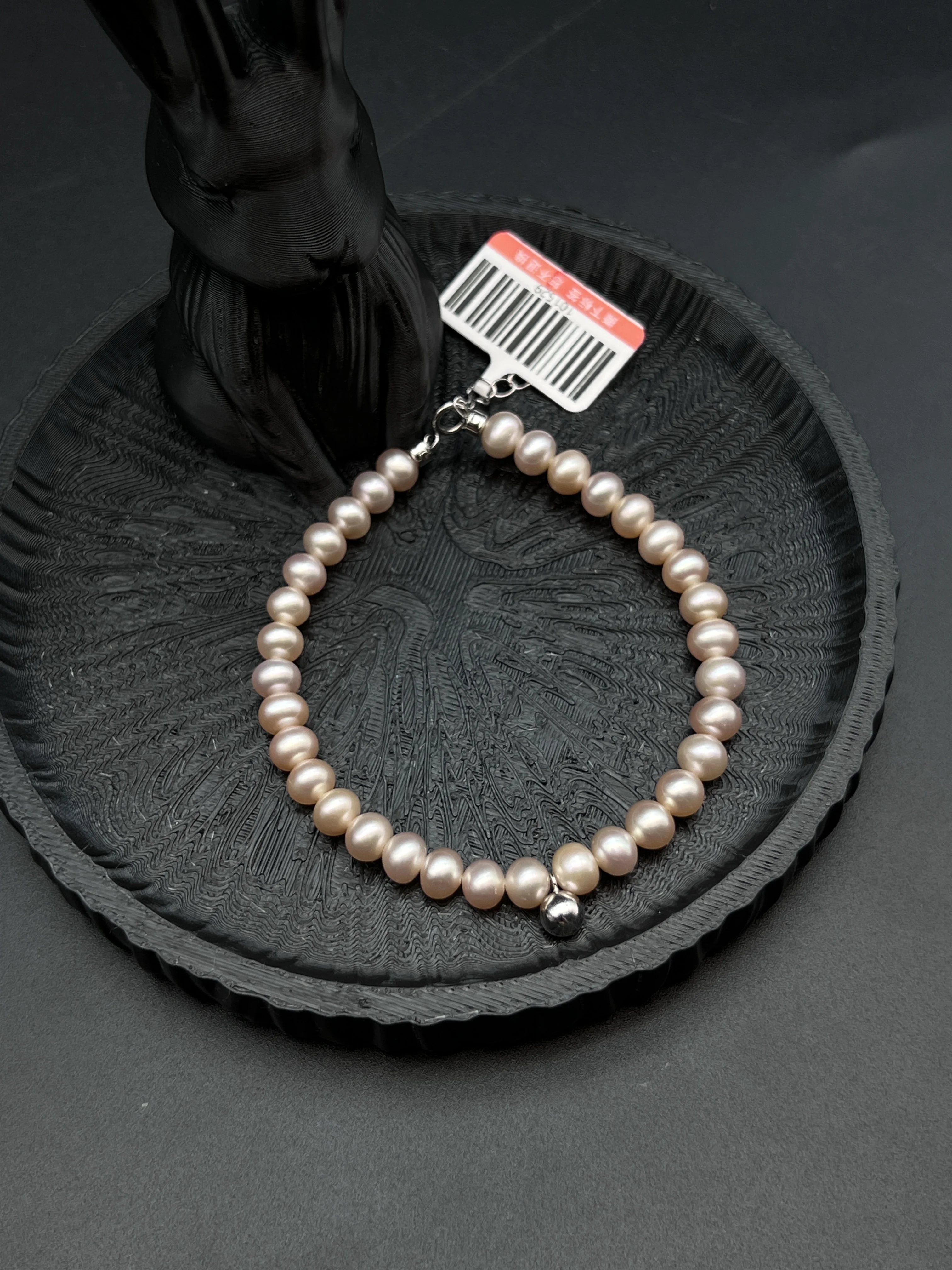 Pastel Pink Pearl Bracelet with Silver Tone Ball Drop Charm
Pastel Pink Pearl Bracelet with Silver Tone Ball Drop Charm