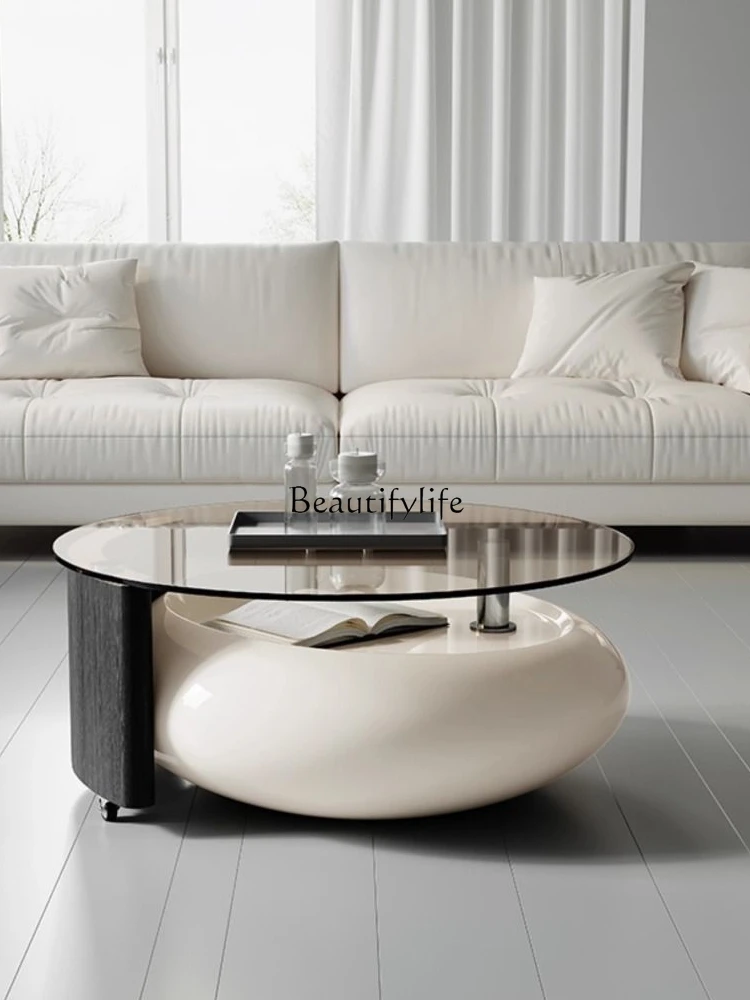 Cream wind rotating coffee table living room home light luxury high sense round glass coffee table Italian minimalist
Cream wind rotating coffee table living room home light luxury high sense round glass coffee table Italian minimalist