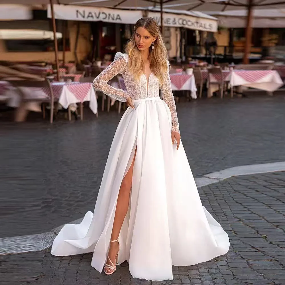 Customized Elegant O Neck Beaded Corset Wedding Dresses A-line Side Split Backless Sweep Court Bridesmaid Dress Long Sleeve Robe
Customized Elegant O Neck Beaded Corset Wedding Dresses A-line Side Split Backless Sweep Court Bridesmaid Dress Long Sleeve Robe