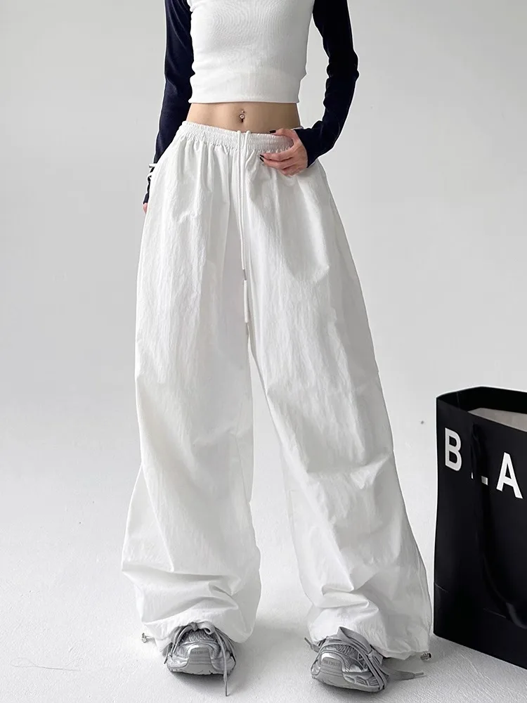 Широкие брюки американского стиля больших размеров для женщин, весна-лето, с высокой талией, белые, рабочие, спортивные, джазовые, свободного кроя, повседневные
Широкие брюки американского стиля больших размеров для женщин, весна-лето, с высокой талией, белые, рабочие, спортивные, джазовые, свободного кроя, повседневные