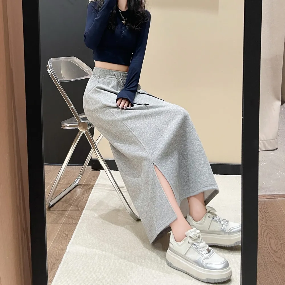 Весенне-осенняя юбка Girl Wei Юбка Минималистичная длинная юбка Женская универсальная юбка трапециевидной формы с высокой талией и разрезом Облегающая юбка оптом
Весенне-осенняя юбка Girl Wei Юбка Минималистичная длинная юбка Женская универсальная юбка трапециевидной формы с высокой талией и разрезом Облегающая юбка оптом