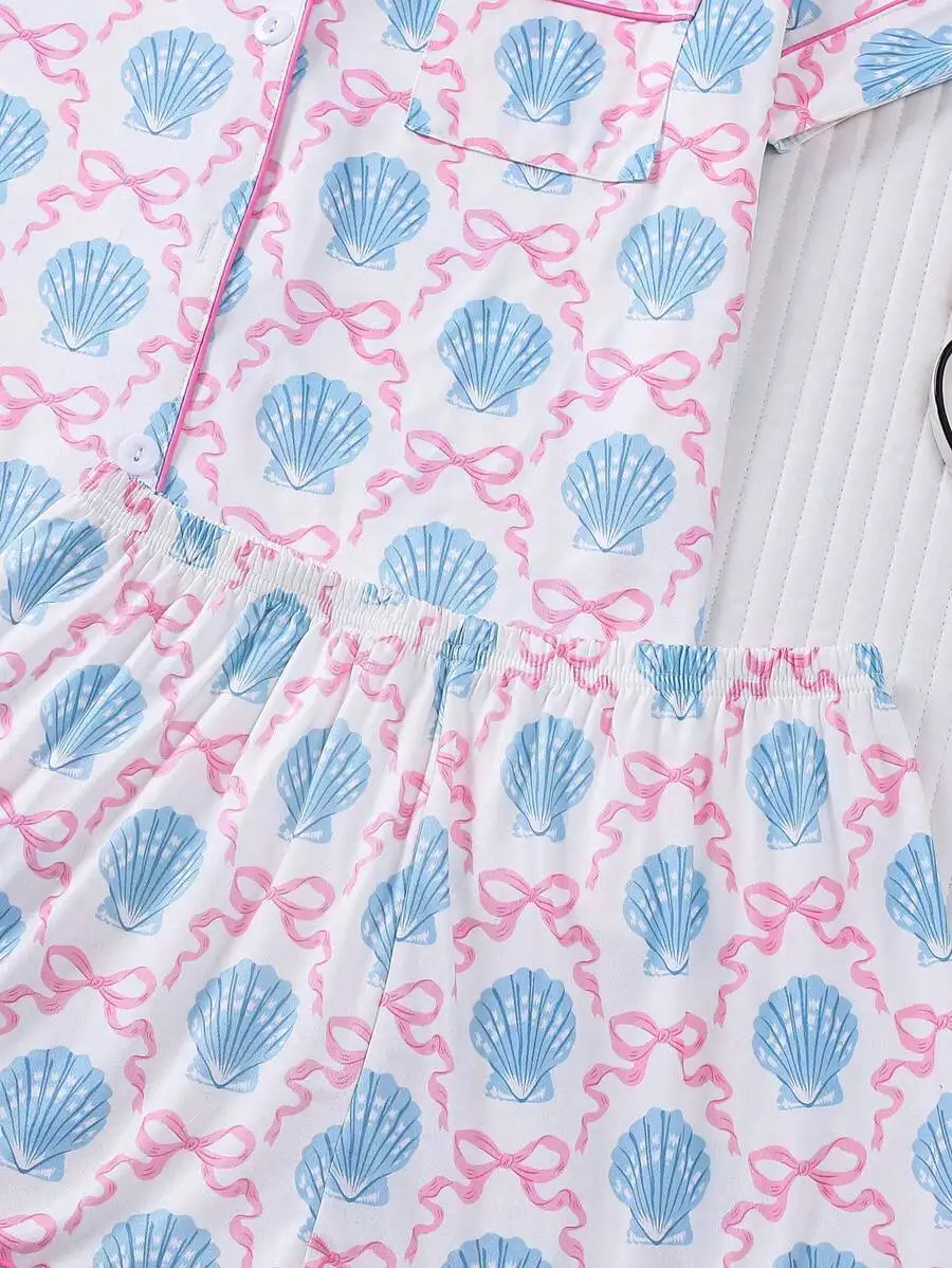 Womens 2-Piece Sleepwear Set With Shell And Bow Print Short Sleeve Top Elastic Waist Shorts
Womens 2-Piece Sleepwear Set With Shell And Bow Print Short Sleeve Top Elastic Waist Shorts