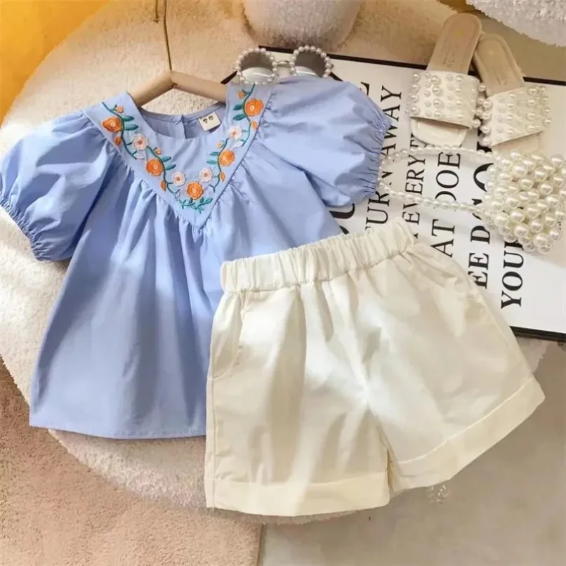 Embroidered Short Sleeve Girls' Set Cute Doll Shirt+Shorts Pocket Summer New Two Piece Set of Children Girls Clothes
Embroidered Short Sleeve Girls' Set Cute Doll Shirt+Shorts Pocket Summer New Two Piece Set of Children Girls Clothes