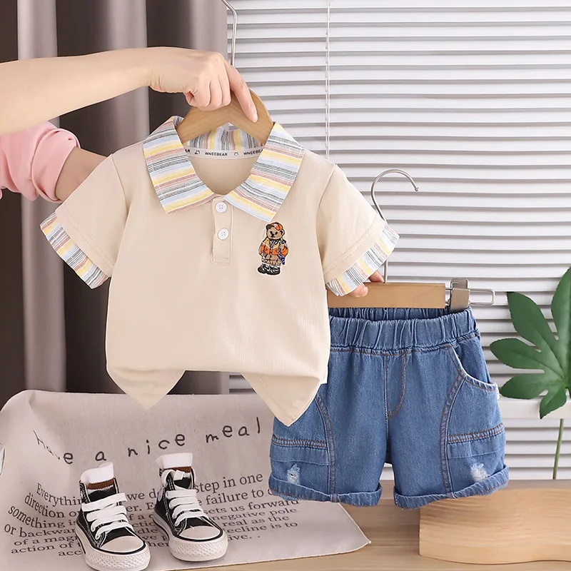 Toddler Boys Outfits 2026 New Summer Cute Bear Embroidery Striped Collar Polo Shirt and Denim Shorts 2pcs Kids Clothes Set
Toddler Boys Outfits 2026 New Summer Cute Bear Embroidery Striped Collar Polo Shirt and Denim Shorts 2pcs Kids Clothes Set
