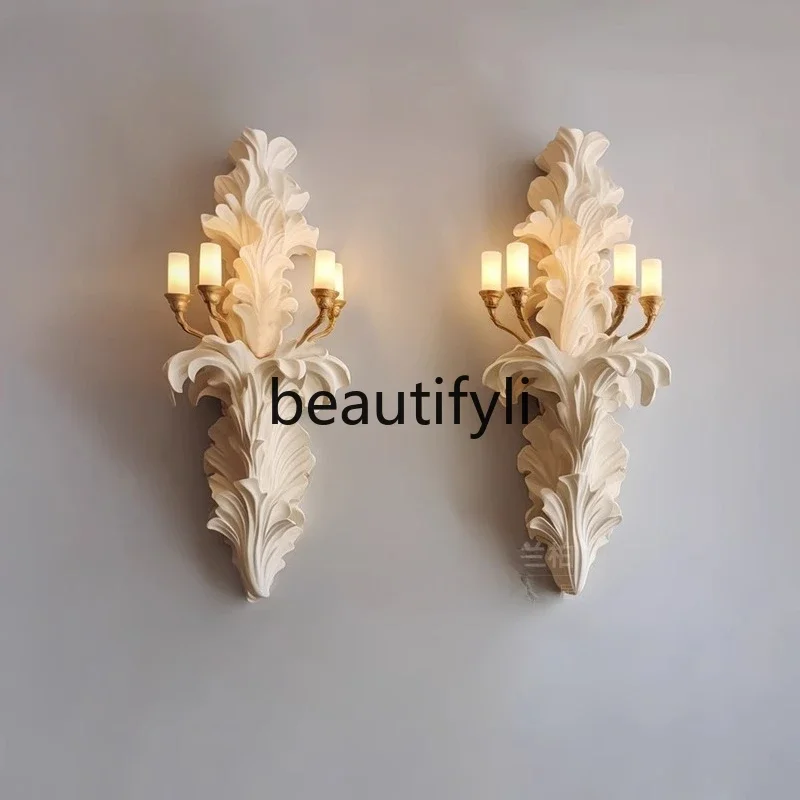 French cream style living room retro stone lamp relief art TV background wall decoration
French cream style living room retro stone lamp relief art TV background wall decoration