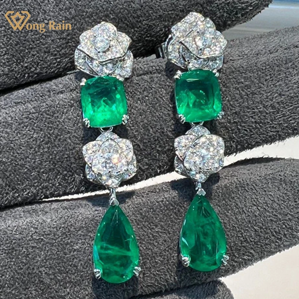 Wong Rain Vintage 925 Sterling Silver Emerald High Carbon Diamond Gemstone Flower Drop Dangle Earrings Fine Jewelry for Women
Wong Rain Vintage 925 Sterling Silver Emerald High Carbon Diamond Gemstone Flower Drop Dangle Earrings Fine Jewelry for Women