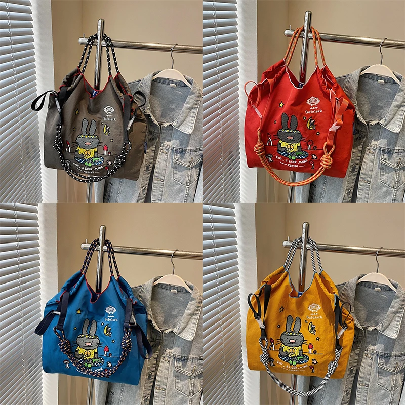 Ball Chain Cartoon Cute Embroidered Canvas Lightweight Shoulder Large Capacity Tote Bag Handheld Canvas Bag
Ball Chain Cartoon Cute Embroidered Canvas Lightweight Shoulder Large Capacity Tote Bag Handheld Canvas Bag