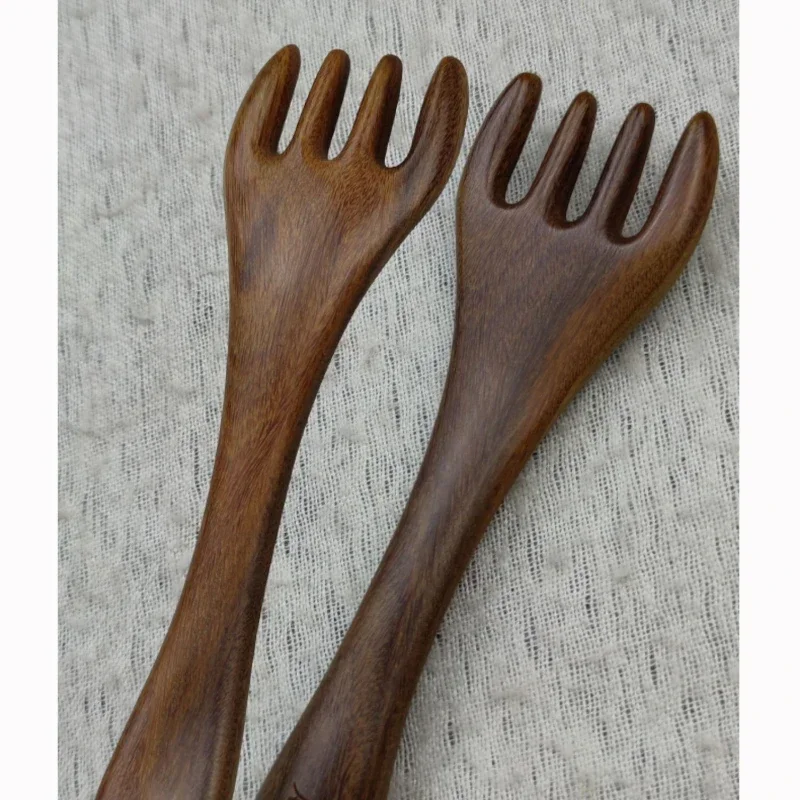 Green sandalwood four-tooth nail rake comb natural solid wood small portable massage comb
Green sandalwood four-tooth nail rake comb natural solid wood small portable massage comb