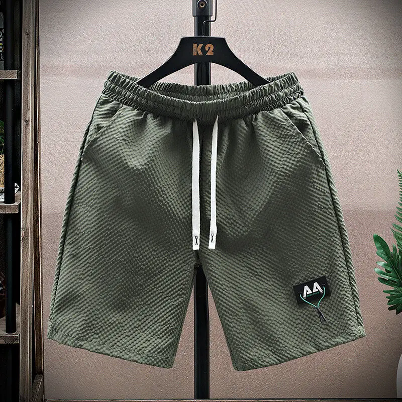 Ice Silk Casual Shorts Men's Summer 2025 New Trend Quick Dry Sports Loose Versatile Beach Five-Quarter Mid-Pants Breathable
Ice Silk Casual Shorts Men's Summer 2025 New Trend Quick Dry Sports Loose Versatile Beach Five-Quarter Mid-Pants Breathable