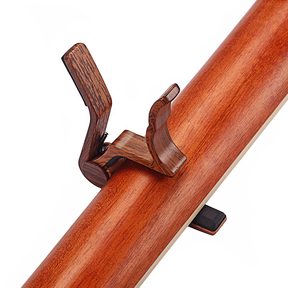 Guitar Capo Aluminum Alloy Wood Color Silicone Pad Quick Release For Acoustic Electric Guitar Ukulele Banjo Mandolin
Guitar Capo Aluminum Alloy Wood Color Silicone Pad Quick Release For Acoustic Electric Guitar Ukulele Banjo Mandolin