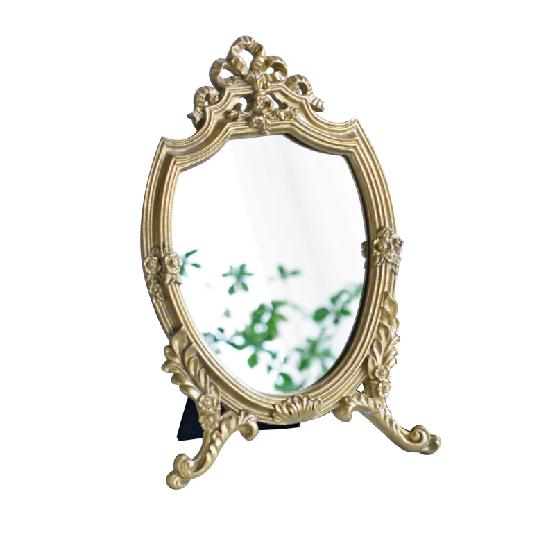 European Style Small Mirror French Retro Light Luxury Palace Style Golden Makeup Dressing Mirror Dressing Decoration Ornaments
European Style Small Mirror French Retro Light Luxury Palace Style Golden Makeup Dressing Mirror Dressing Decoration Ornaments