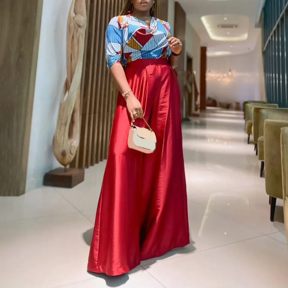 Fashion Two Piece Print Half Sleeved Pullover Top High Waist Solid Color Wide Leg Pants Set Elegant Office Lady Suit 
Fashion Two Piece Print Half Sleeved Pullover Top High Waist Solid Color Wide Leg Pants Set Elegant Office Lady Suit