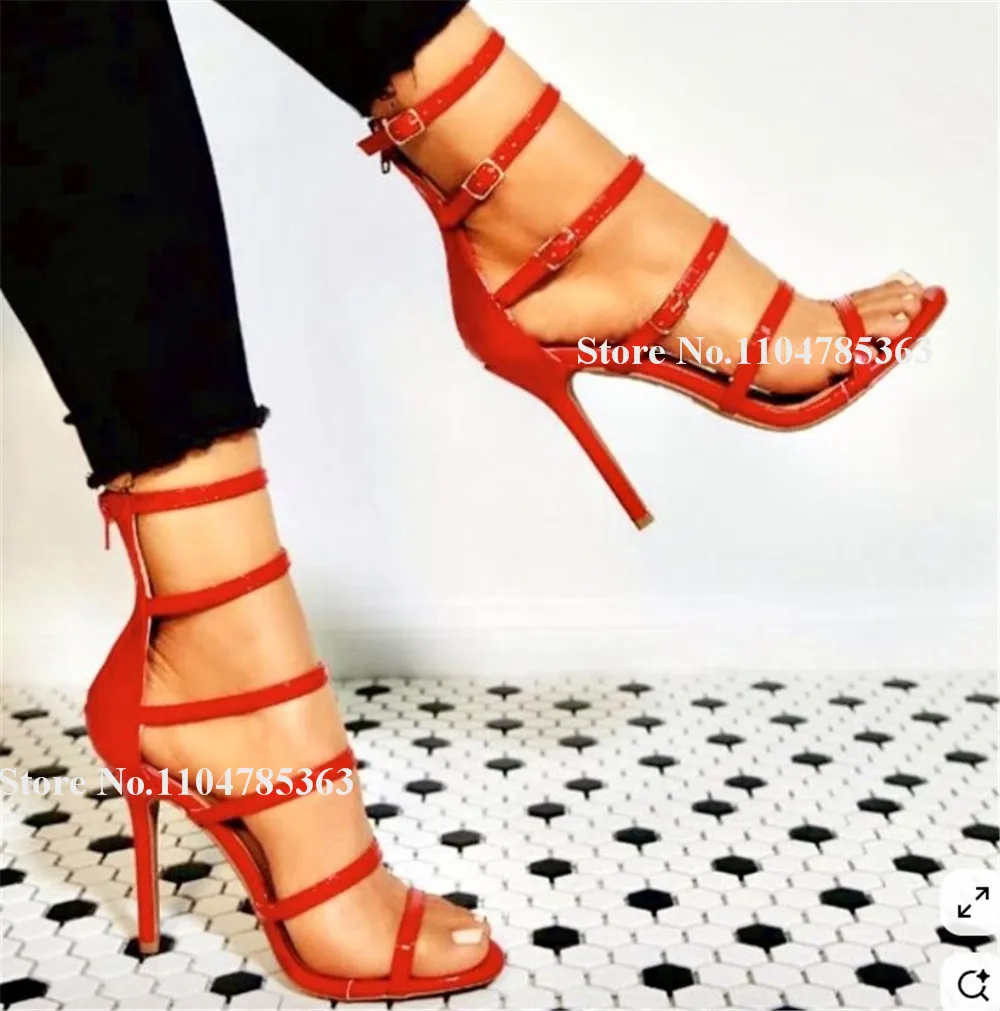 Сексуальные босоножки на шпильке с узкими ремешками и открытым носком, красные, черные модельные туфли из лакированной кожи с пряжками на тонком каблуке, большой размер
Сексуальные босоножки на шпильке с узкими ремешками и открытым носком, красные, черные модельные туфли из лакированной кожи с пряжками на тонком каблуке, большой размер