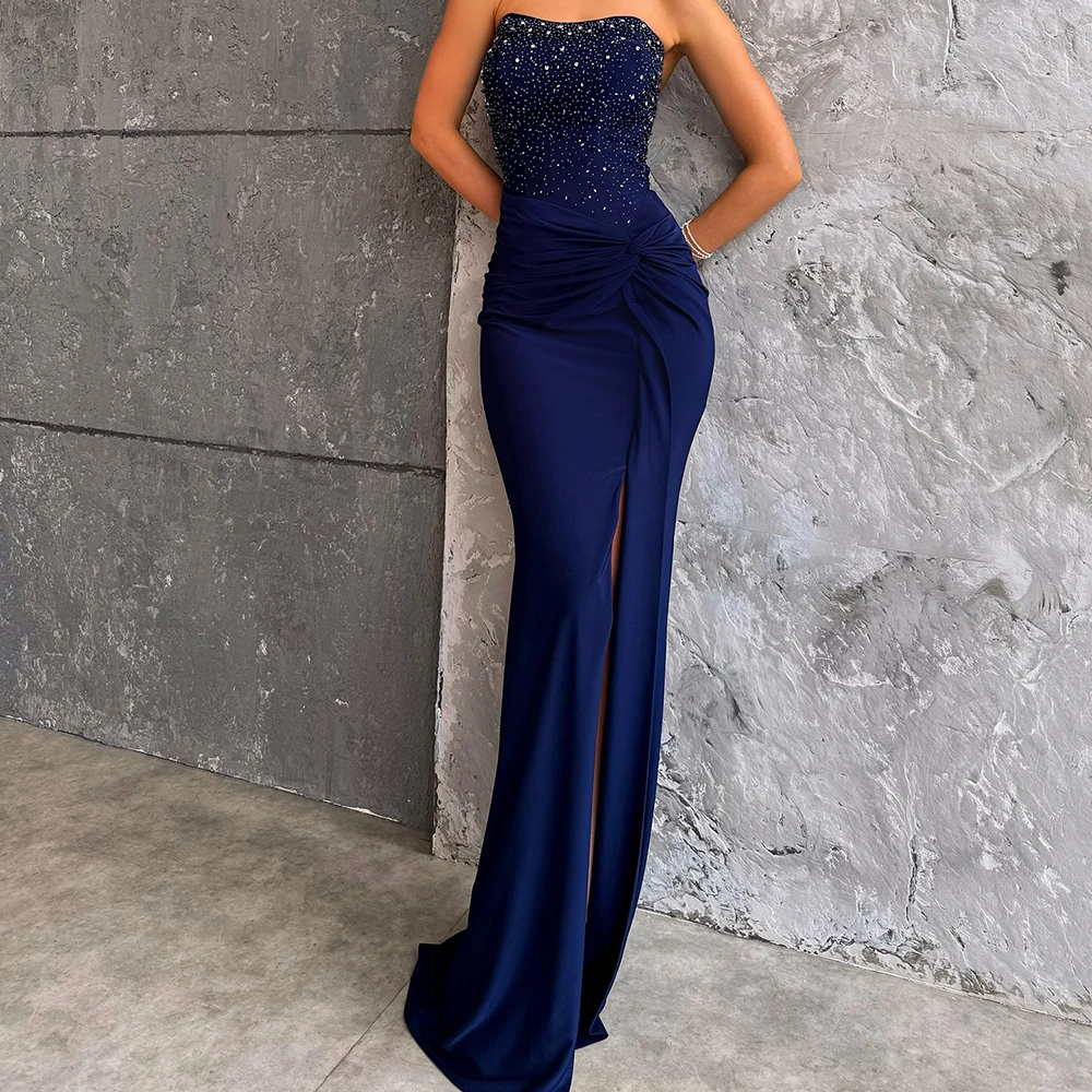 Прямые вечерние платья по индивидуальному заказу, длиной до пола, без бретелек, без рукавов, платье для выпускного вечера, модное простое драпированное вечернее платье со складками и кристаллами
Прямые вечерние платья по индивидуальному заказу, длиной до пола, без бретелек, без рукавов, платье для выпускного вечера, модное простое драпированное вечернее платье со складками и кристаллами