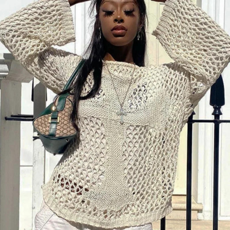 Round neck cross hollow long-sleeved blouse loose summer see-through retro sexy top beach knitwear
Round neck cross hollow long-sleeved blouse loose summer see-through retro sexy top beach knitwear