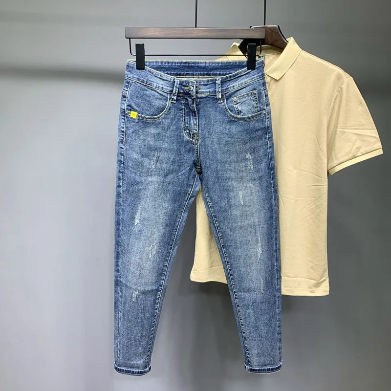 Летние синие мужские джинсы Slim Fit, повседневные эластичные брюки длиной 9/10, молодежные модные джинсы с молнией на средней талии, классические джинсы из денима
Летние синие мужские джинсы Slim Fit, повседневные эластичные брюки длиной 9/10, молодежные модные джинсы с молнией на средней талии, классические джинсы из денима
