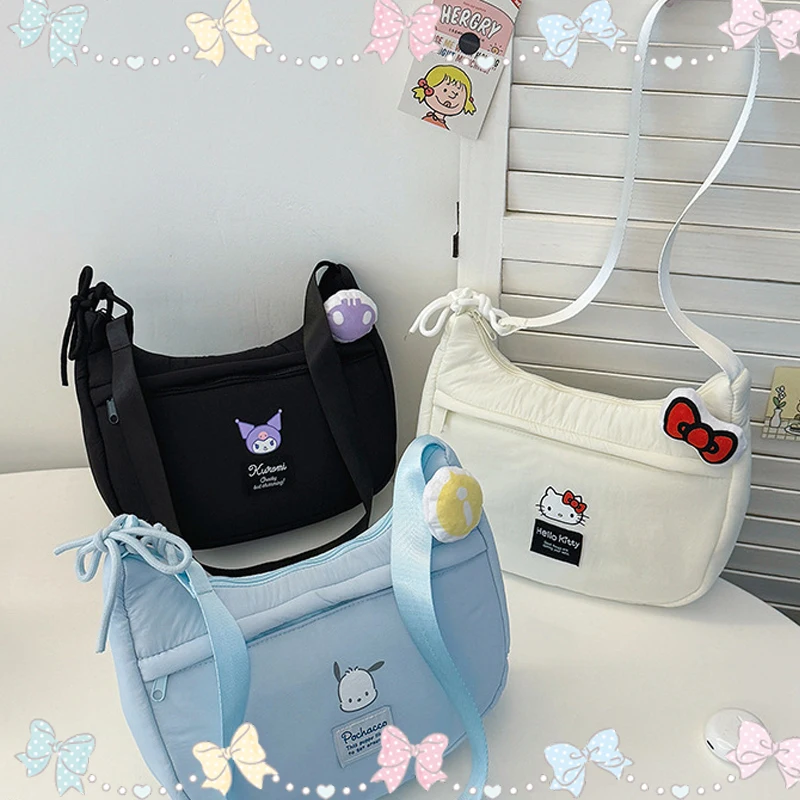 Новая сумка через плечо Hello Kitty для девочек, вместительная сумка на плечо, мультяшная сумка-тоут в стиле каваи, многофункциональная сумка-пуховик
Новая сумка через плечо Hello Kitty для девочек, вместительная сумка на плечо, мультяшная сумка-тоут в стиле каваи, многофункциональная сумка-пуховик