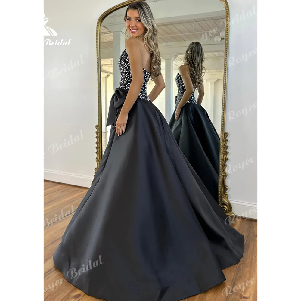 Roycebridal Black Bow Strapless Prom Dress 2026 Satin Ball Gown Evening Dress Sleeveless Formal Gown Customized
Roycebridal Black Bow Strapless Prom Dress 2026 Satin Ball Gown Evening Dress Sleeveless Formal Gown Customized