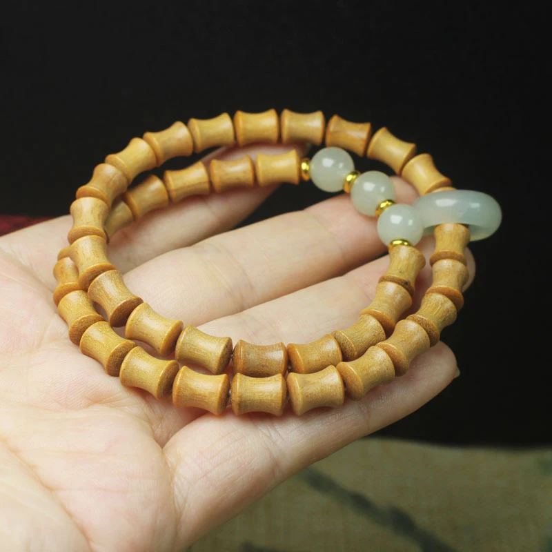Sandalwood bamboo knot double-layer bracelet with running ring design, unisex Buddhist prayer beads jewelry
Sandalwood bamboo knot double-layer bracelet with running ring design, unisex Buddhist prayer beads jewelry