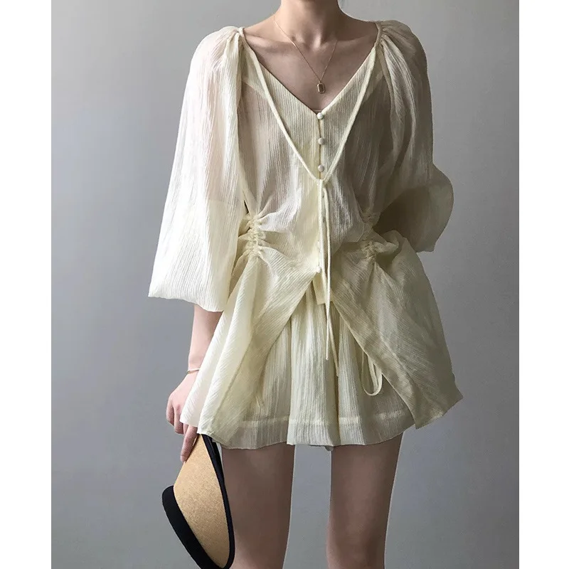 Retro slimming set for women's summer, new Korean style V-neck lace up pleated shirt, wide leg shorts two-piece set, trendy 
Retro slimming set for women's summer, new Korean style V-neck lace up pleated shirt, wide leg shorts two-piece set, trendy