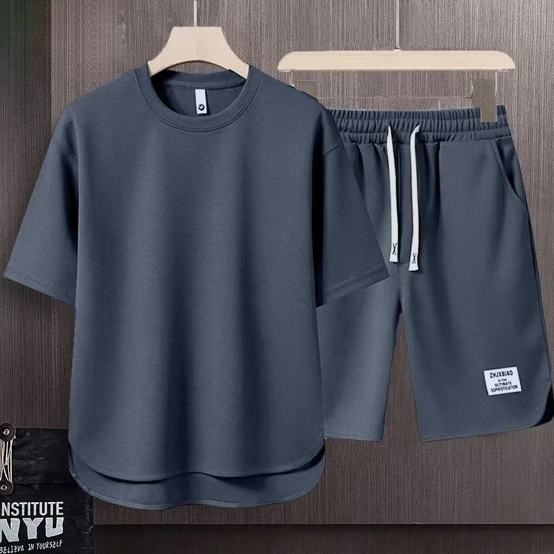 Summer New Trendy Solid Color Breathable Short Sleeve T-shirt and Shorts Set Men's Casual Loose Sport High Quality Two-Piece Set
Summer New Trendy Solid Color Breathable Short Sleeve T-shirt and Shorts Set Men's Casual Loose Sport High Quality Two-Piece Set