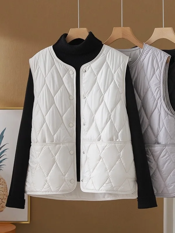 Корейский повседневный легкий теплый пуховый жилет из хлопка для женщин, зимний, свободный, стройнящий, универсальный, с подплечниками, модный
Корейский повседневный легкий теплый пуховый жилет из хлопка для женщин, зимний, свободный, стройнящий, универсальный, с подплечниками, модный