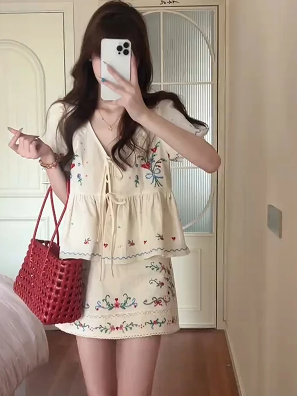 Sweet Style Embroidered Hook Flower Lantern Sleeve Belted Shirt Short Skirt Two Piece Set Women Summer New Fashion Anti Aging...
Sweet Style Embroidered Hook Flower Lantern Sleeve Belted Shirt Short Skirt Two Piece Set Women Summer New Fashion Anti Aging...