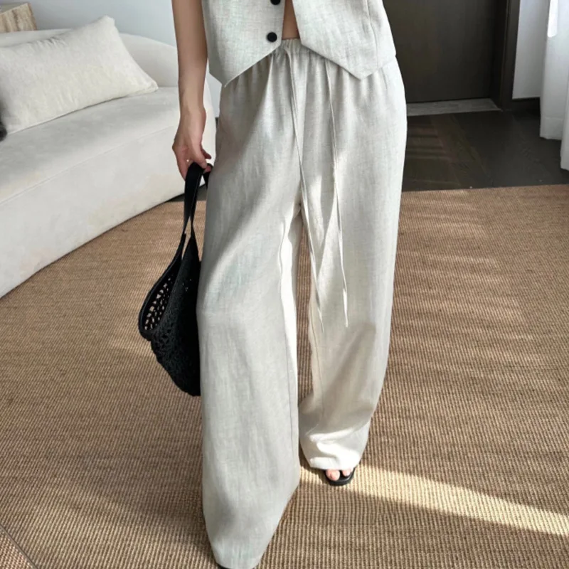 Летние свободные прямые широкие повседневные брюки из 100% льна с эластичной резинкой на талии
Летние свободные прямые широкие повседневные брюки из 100% льна с эластичной резинкой на талии